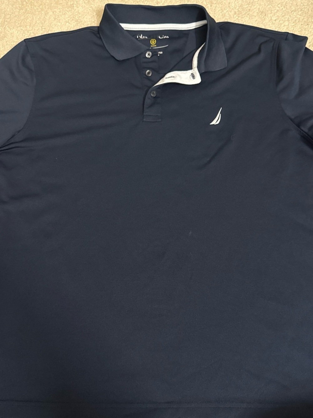Nautica Navy Polo with White Trim and Sailboat Logo
